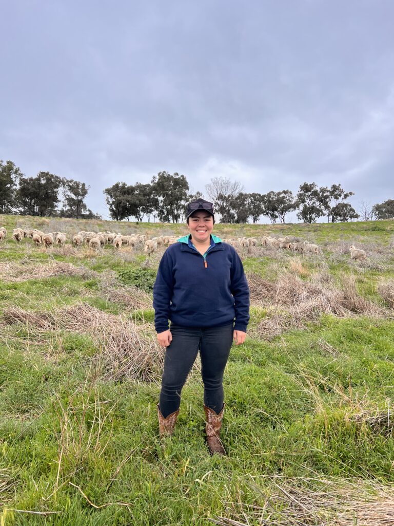 Country Education Foundation of Australia 2023 Launching Star Heather Walker working with sheep.